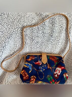 T. Cappelli Navy Crossbody Bag with Multicolor Western Boot Print and Tan Trim